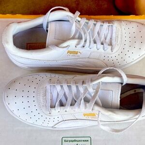 US Woman size 5. White Pumas